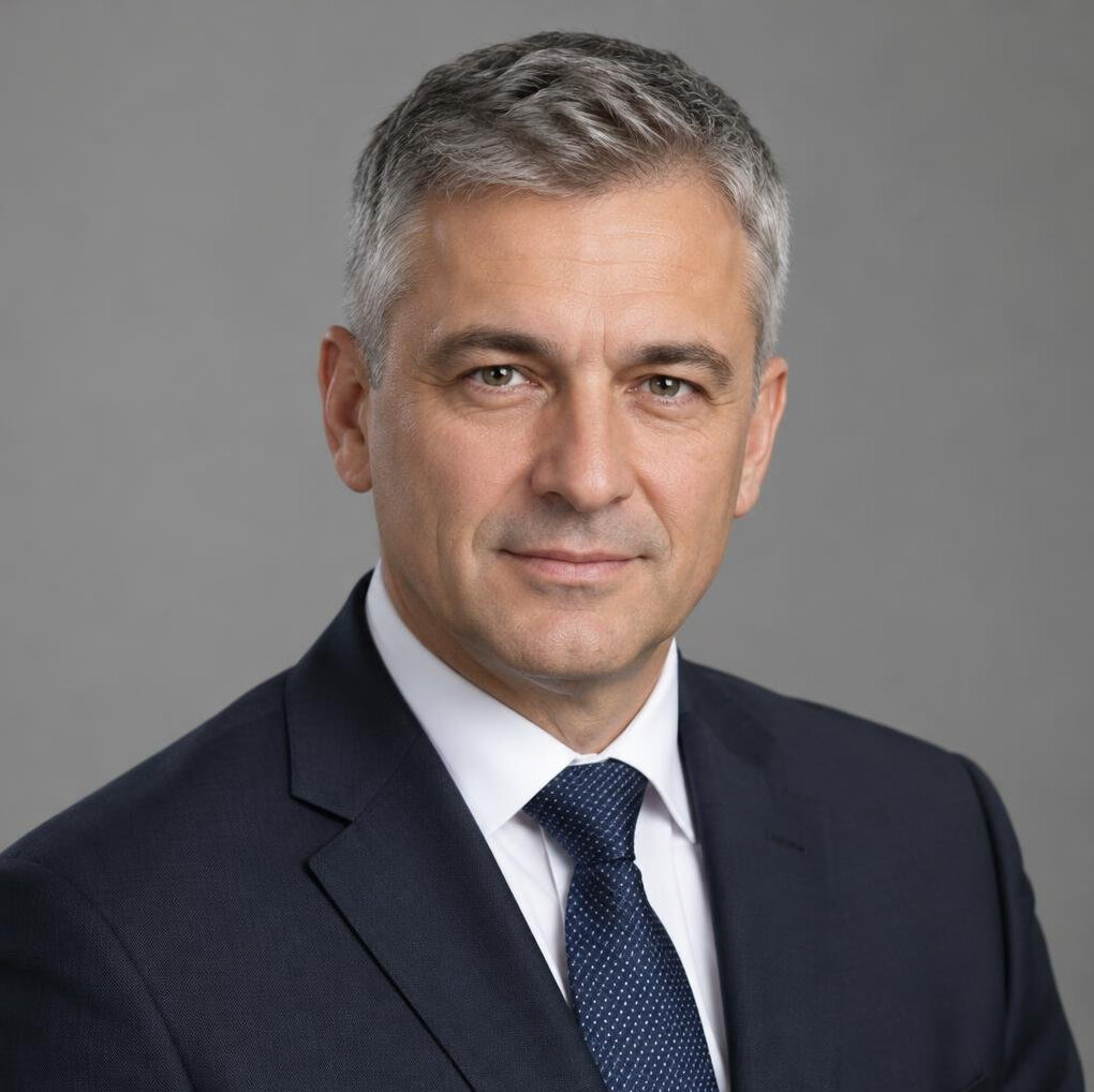 Portrait of a businessman in a dark suit with a tie